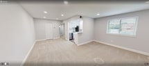This newly renovated apartment in Alexandria, VA offers 770 square feet of contemporary living space. The property features two bedrooms, including a primary bedroom of 180 square feet, and one bathroom. The modern kitchen is a highlight, boasting white cabinetry, stainless steel appliances, and granite countertops. Large windows in every room flood the space with natural light, creating a bright and airy atmosphere.

The living area is spacious and open, perfect for relaxation or entertaining. Neutral-toned walls and plush carpeting throughout most rooms add to the apartment's fresh, clean aesthetic. The bathroom, while not pictured, likely matches the modern finishes seen elsewhere in the home.

Recessed lighting and ceiling fixtures provide ample illumination, complementing the natural light. Each bedroom offers closet space with white sliding doors, maintaining the cohesive look of the apartment. The entryway features a small section of hardwood flooring, adding a touch of warmth to the space.

Overall, this apartment combines functionality with contemporary style, offering a comfortable living space in a desirable Alexandria location. Its efficient layout maximizes the use of the 770 square feet, making it an attractive option for those seeking a modern, low-maintenance home.