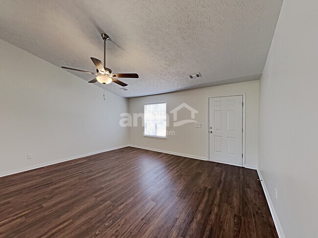 Foto del edificio - 4025 River Rock Way