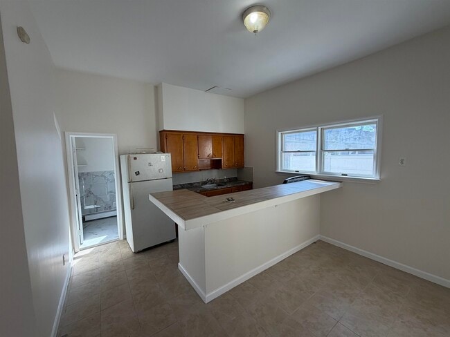 Building Photo - 369-371-371 Ave E