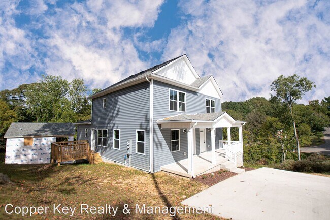Foto del edificio - 3 br, 2 bath House - 910 E Happy Hollow Drive