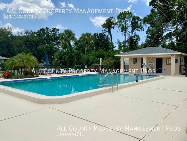 Building Photo - 7060 W Country Club Dr N