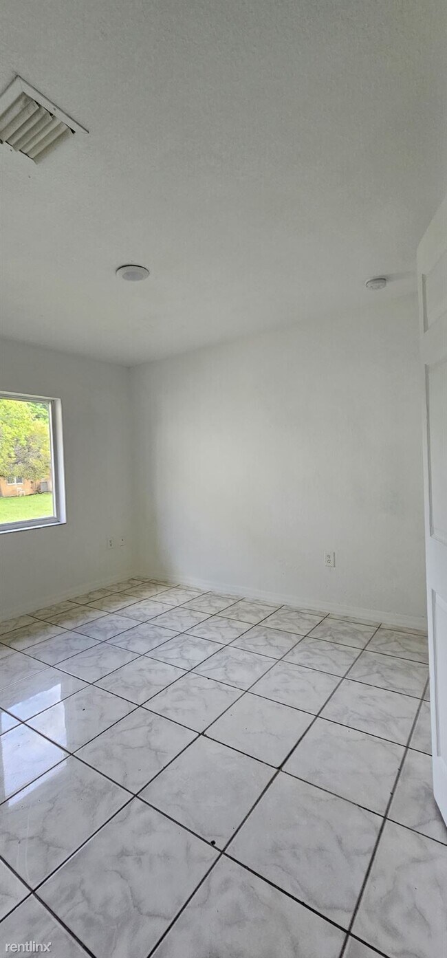 Building Photo - 4 br, 2 bath House - 7601 NW 20th Ave # 19...