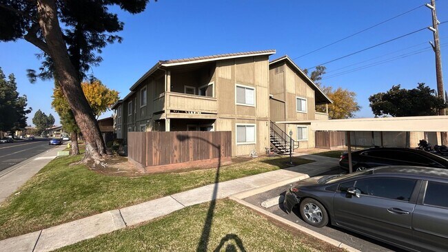 Building Photo - Water/Sewer/Garbage Included