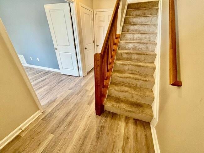 Building Photo - Experience Maintenance-Free Townhouse Livi...