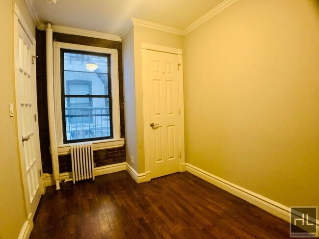 Building Photo - Renovated East Village 2-Bedroom with Sunl...