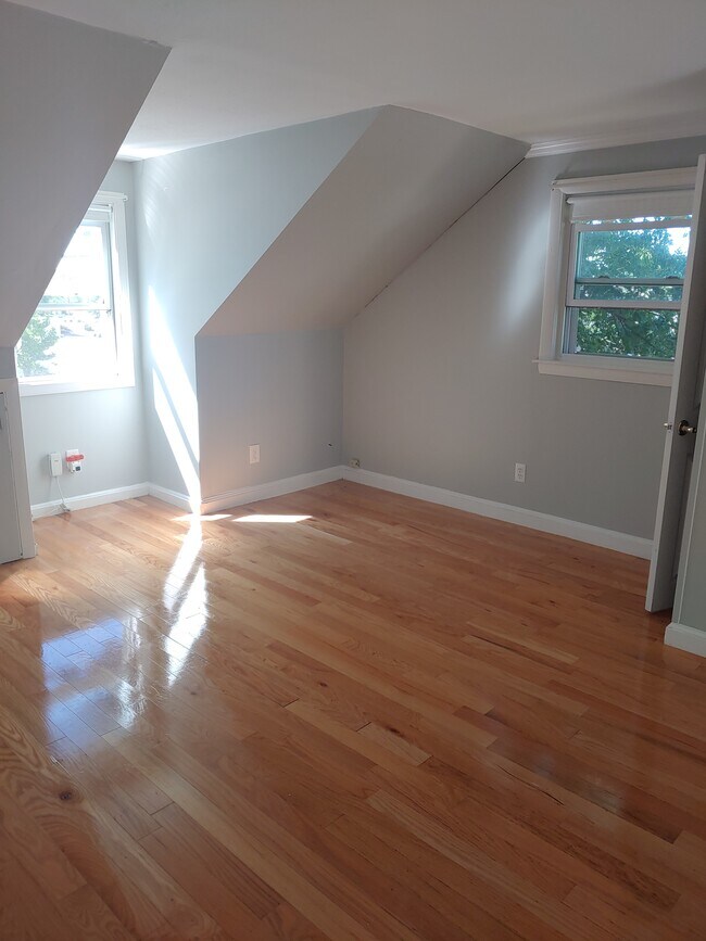 Living room over 20 feet - 2 windows and 1 12 ft sliding door - 623 Old West Central St