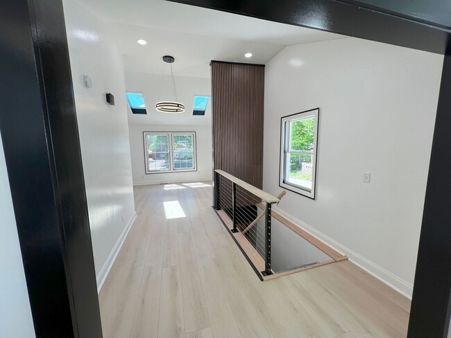 Building Photo - Step into modern luxury right here in Bloo...