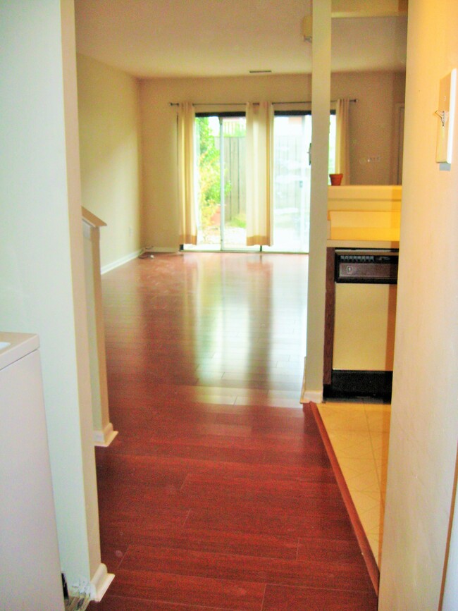 View (Shown unfurnished) from Garage through living area to courtyard - 870 N Pennock St