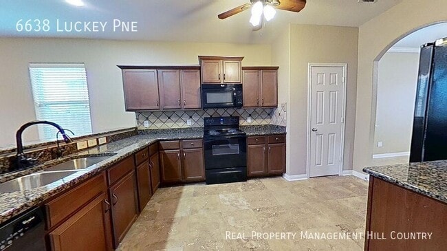 Building Photo - 6638 Luckey Pine