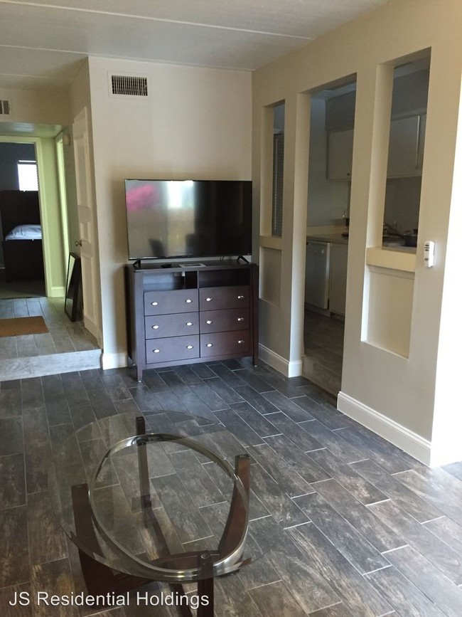 Building Photo - 1 br, 1 bath Apartment - 115 S Lois Ave # 110