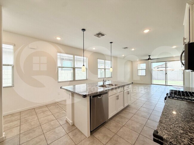 Building Photo - 40015 W Rio Lobo Dr