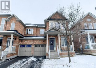 Building Photo - 21 Chokecherry Cres