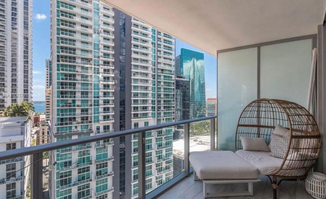 Spacious balcony with partial water, and city views - 1100 S Miami Ave