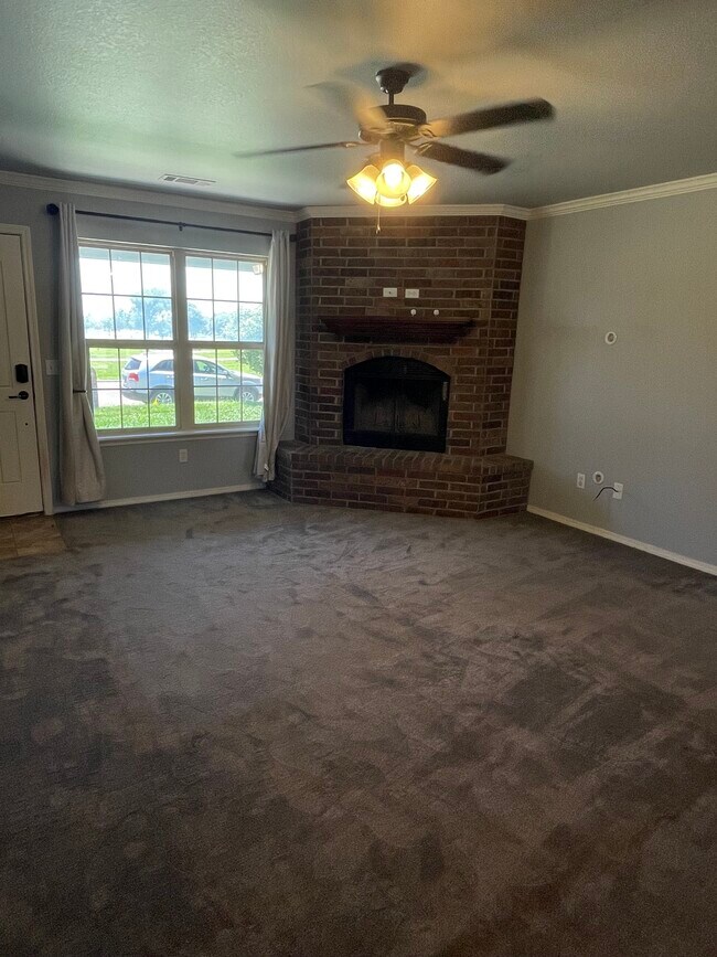 Living room w/ fireplace - 6813 Fanchun St