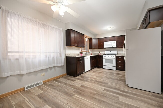 Foto del edificio - 5850 N Mulligan Ave