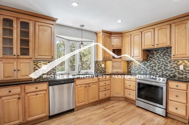 Building Photo - West Side 4 Bedroom Home with Mountain Setting Open Space Behind, 2 car Garage with AC