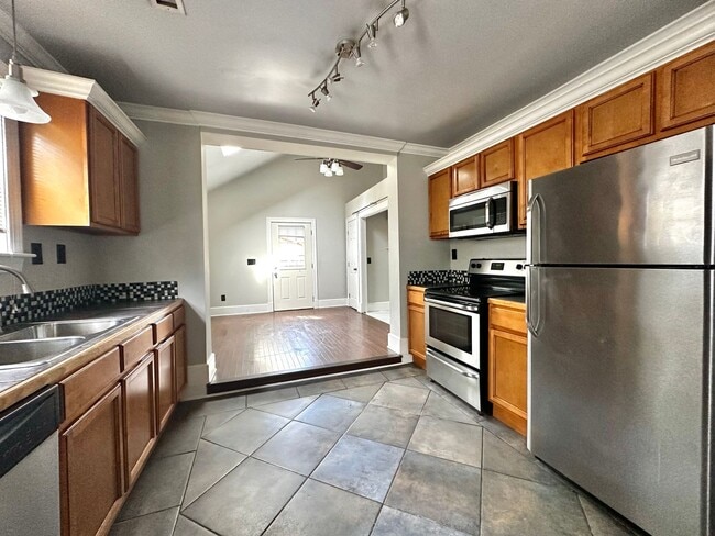 Building Photo - Updates to Inside and Outside!!  2/2 House with fence! Pet friendly!