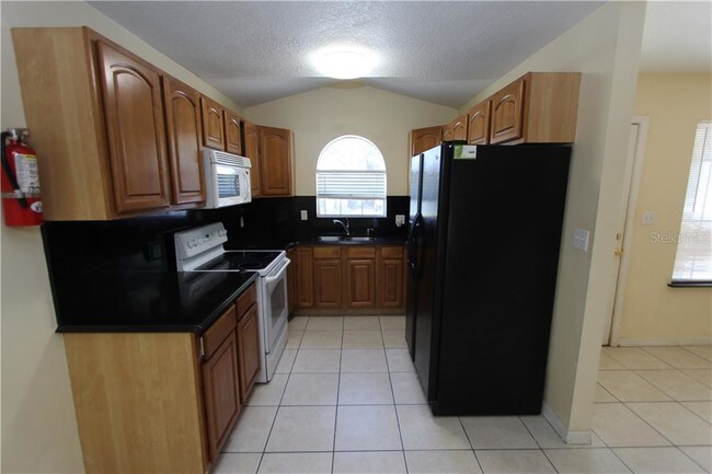 Building Photo - 6705 Magnolia Pointe Cir