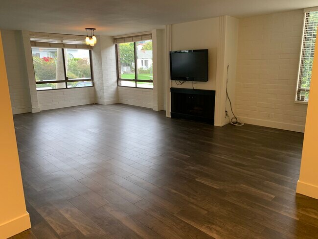 living room (and dining room area (next to windows) - 2304 S Beverly Glen Blvd