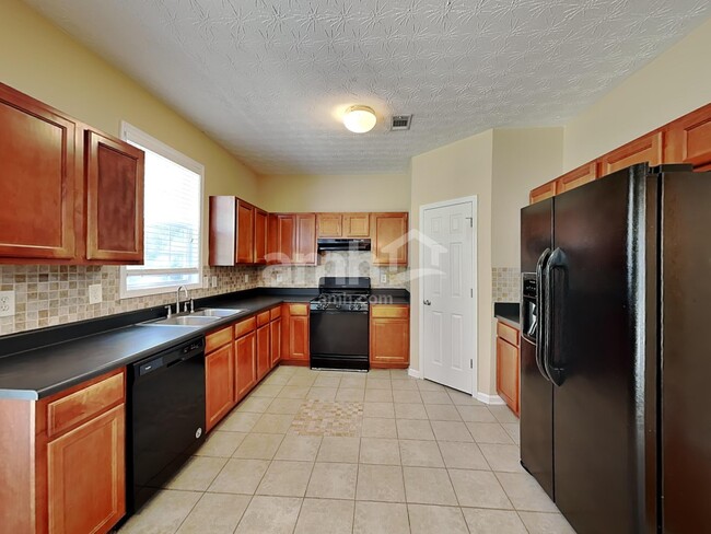 Foto del edificio - 6165 Ambercrest Ct