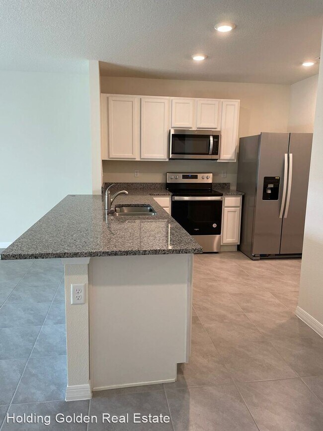 Building Photo - 3 br, 2.5 bath House - 12311 Bowes Branch ...