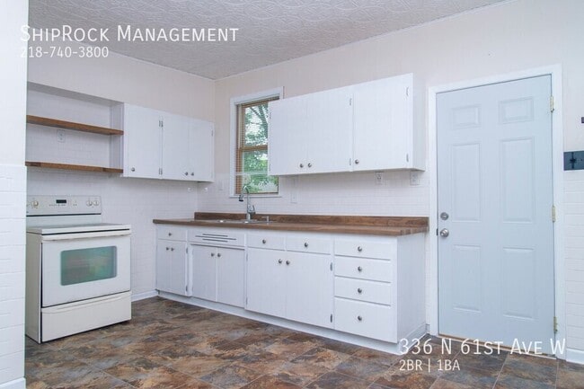 Building Photo - 336 N 61st Ave W