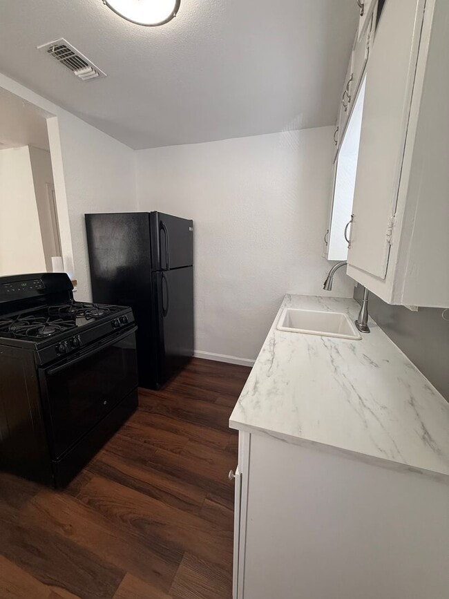 Photo - Newly Renovated 2 Bed Home | Hardwood Floors + Updated Interior!