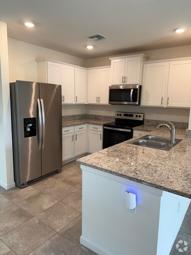 Building Photo - 10997 SW Vasari Way