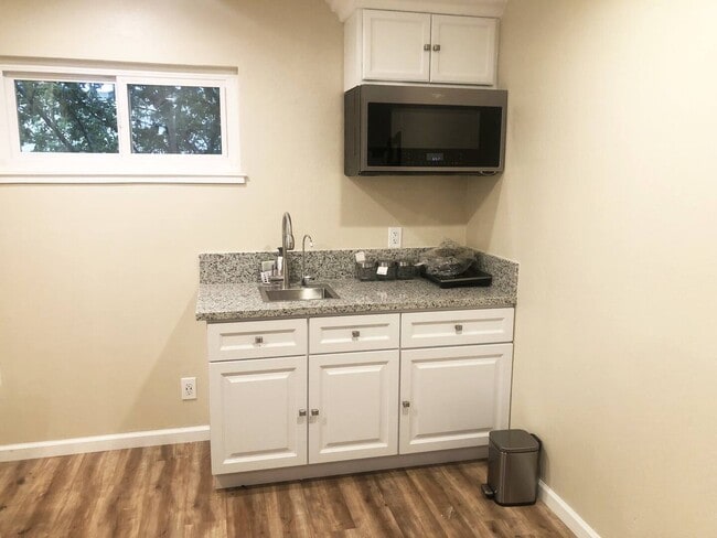 Kitchen with full functional microwave - 1845 Blue Spruce Ct