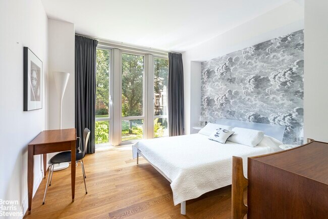 Building Photo - CHELSEA ENCLAVE WITH SEMINARY PARK VIEWS