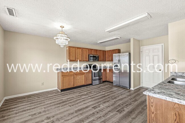 Building Photo - Spacious 3-Bedroom Home with Open Layout &...