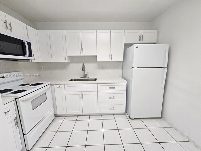 Foto del edificio - 6961 W 14th Ct