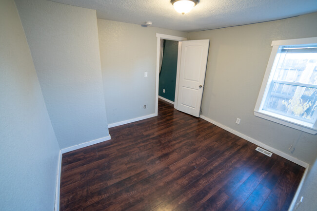 Bedroom off of living room - 5410 Monaco St