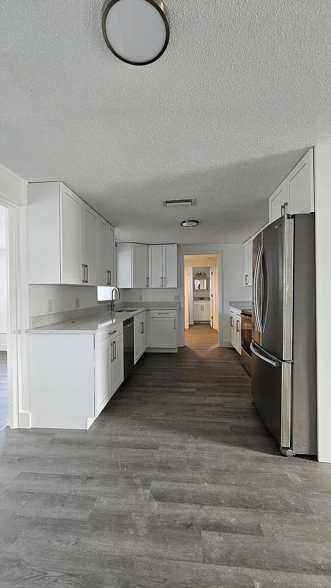 Foto del edificio - 6441 Woodland Ln