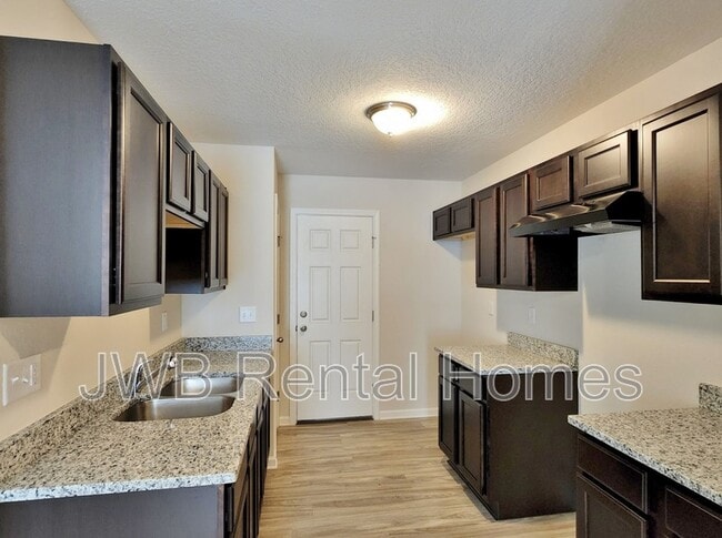 Building Photo - 7617 Eaton Ave