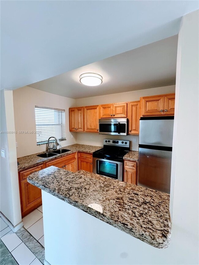 Building Photo - 8595 Sunrise Lakes Blvd