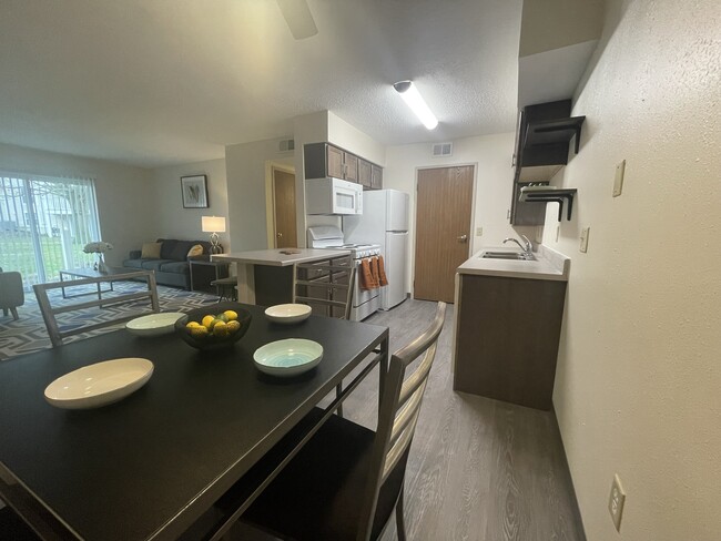 New Kitchen with Breakfast Bar - Pine Woods Apartments