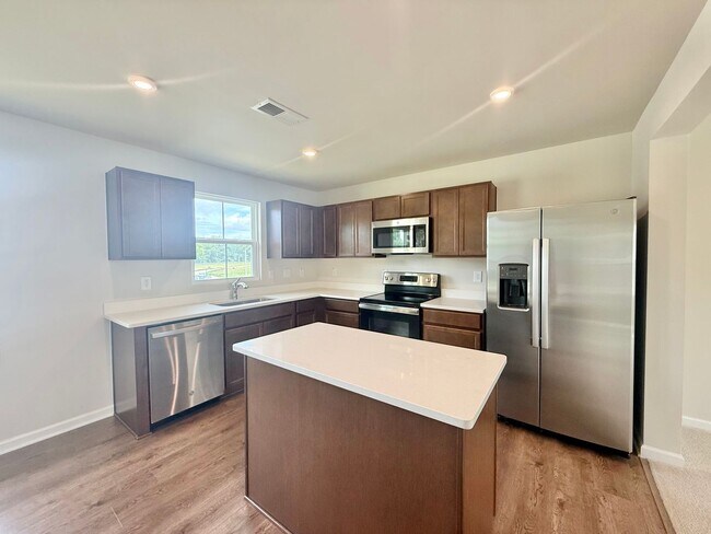 Building Photo - Newly Built 3BD, 2.5BA Wendell Townhome in an HOA Community with Amenities