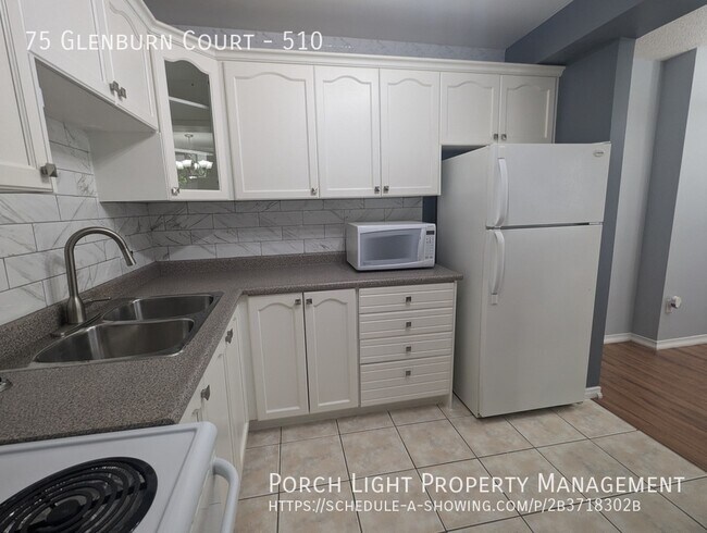 Building Photo - 2 Bedroom Condo with Private Laundry and O...