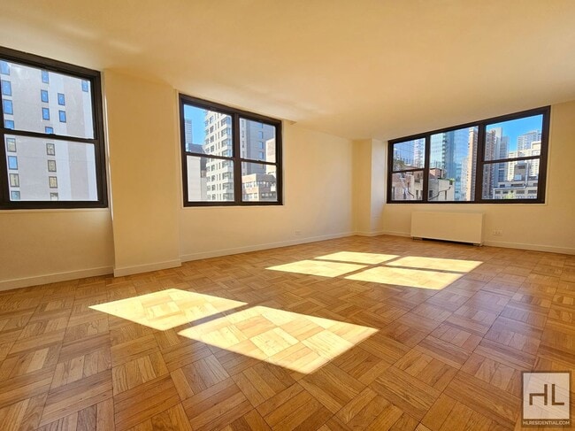 Building Photo - Corner 1-Bedroom in Midtown East | 11th Floor, Full-Service Building