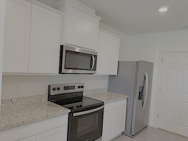 Building Photo - 9982 SW Triton Wy