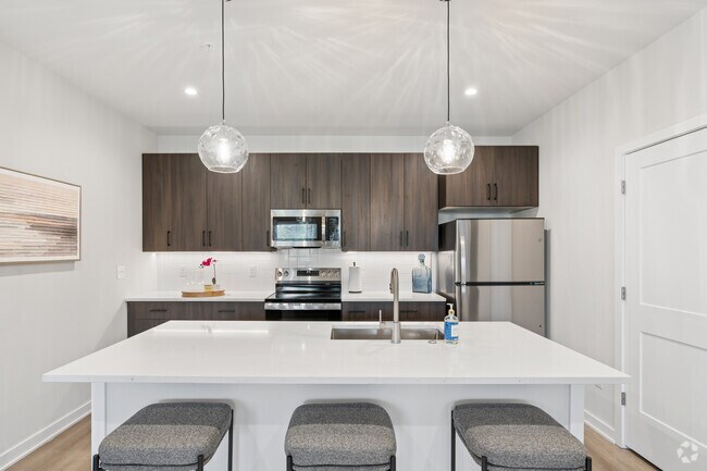 2 habitaciones, 2 baños con estudio - 1308 pies cuadrados - Cocina - Milliner Lofts
