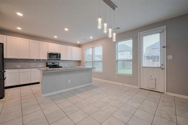 Foto del edificio - 5011 Pine Ridge Knoll Ct