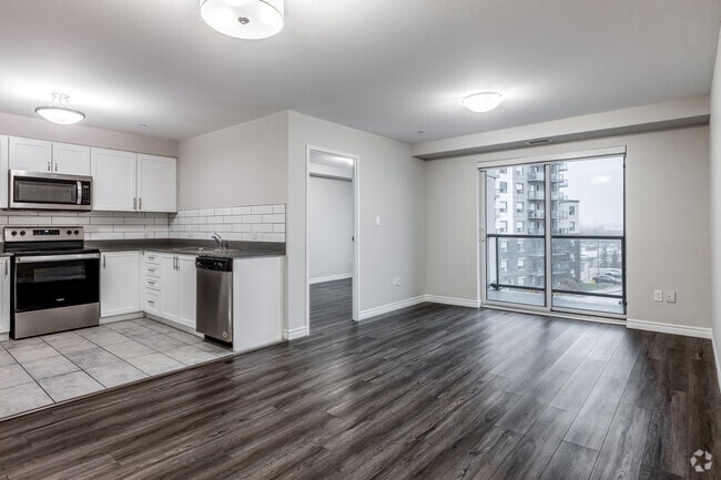 3BR, 2BA - 1,266SF - Kitchen/Living Room - 220 Ira Needles Blvd