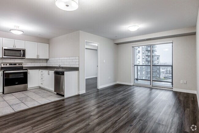 3BR, 2BA - 1,266SF - Kitchen/Living Room - 220 Ira Needles Blvd