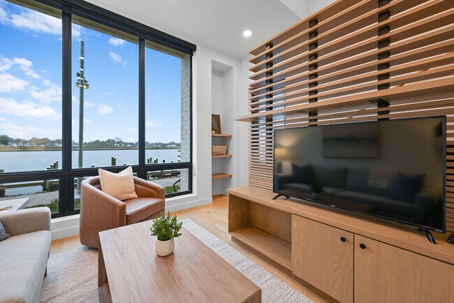 Sala de estar amueblada - Mackson Corners Apartments