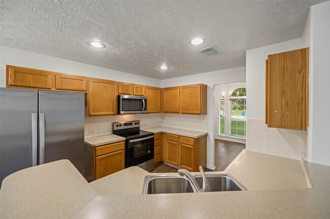 Foto del edificio - 18401 Sunrise Oaks Ct