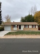 11707 E Virginia Pl