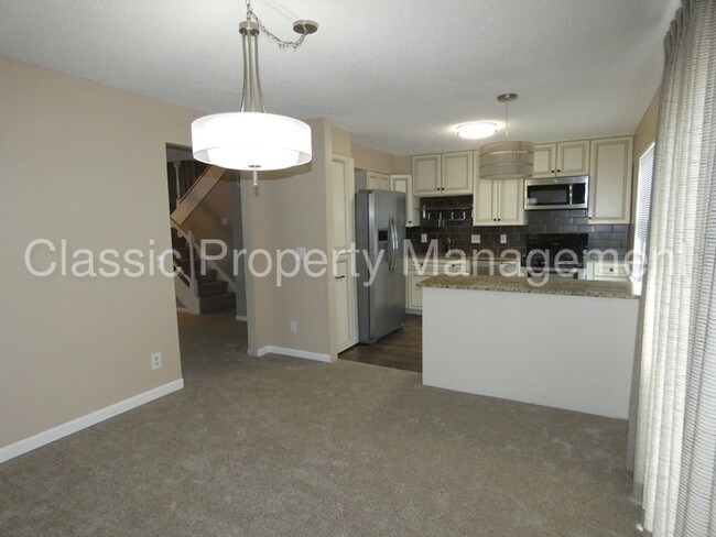 Building Photo - Great Location Townhome- 8037 N Harrison Lane