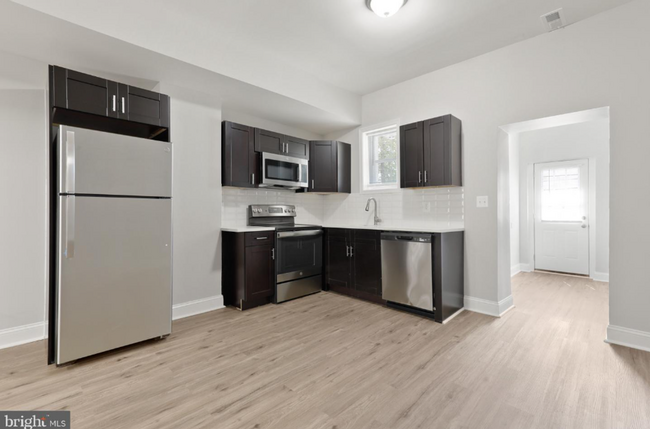 Building Photo - Newly Remodeled Three-Bedroom Townhome